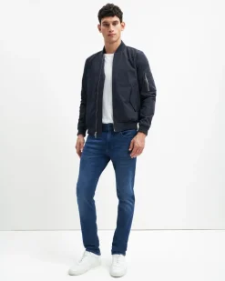Luxe Performance Plus Slimmy Tapered In Mid-Blue